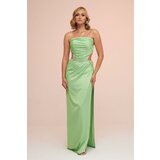 Carmen pistachio green satin strapless long evening dress with side slit Cene