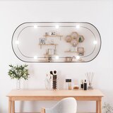 vidaXL Stensko ogledalo z LED lučkami 45x100 cm stekleno ovalno Cene