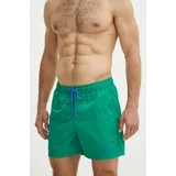Tommy Jeans Kopalne kratke hlače zelena barva, UM0UM03202