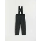 Reserved podložene hlače z naramnicami - črna