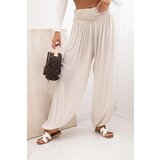 Kesi Włoski Women's viscose trousers with wide leg and ruffles beige | Shoptok.si