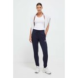 Adidas Pamučni donji dio trenirke boja: tamno plava, s aplikacijom | shoptok.hr