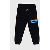 Calvin Klein Jeans Otroška bombažna trenirka črna barva | Shoptok.si