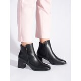 Shelvt Black women's heeled boots Cijene