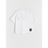 Reserved oversize majica z reliefnim potiskom - bela Cene