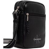 Calvin Klein Jeans Torbe za čez ramo BOLD LOGO WEBBING REPORTER LV04D3418G Črna Cene