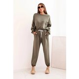 Kesi Włoski Ladies' butter set with a loose sweatshirt and pants with the inscription LOVE khaki | Shoptok.si