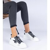 Gemre White sneakers adorned with a glittery star by Moransa | ePonuda.com