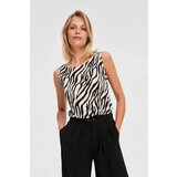 Marisse White Animal Print Top | ePonuda.com