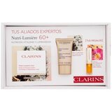 Clarins Nutri-Lumière Gift Set 60+ set: dnevna krema za obraz Nutri-Lumiére 50 ml + nočna krema za obraz Nutri-Lumiére 15 ml + olje za ustnice Lip Comfort Oil 1,4 ml za ženske | Shoptok.si