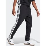 Adidas Športne hlače črna / bela | Shoptok.si