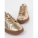 Sergio Leone s gold leather sneakers | ePonuda.com