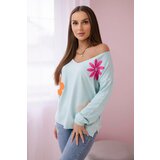 Kesi Sweater blouse with mint floral pattern Cene