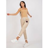 Fashion Hunters Beige trousers made of eco-leather with pockets Lana Cene