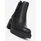 Sergio Leone Elegant black ankle boots with elastic insert by | ePonuda.com