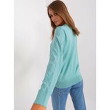 Fashion Hunters Women's mint sweater with patterns Cene