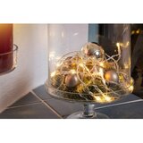 Konstsmide LED svetlobna veriga (Za notranjo uporabo, Barva svetlobe: Toplo bela, Število svetlobnih elementov: 20 kos, Na baterije, Prozoren) | Shoptok.si