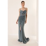 By Saygı Rope Straps with a slit in the front and Draped Crystal Fabric Long Dress with Chain Detail. Cene