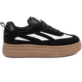 Shelvt Black women's sneakers with white inserts. | Shoptok.si