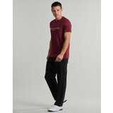 Tommy Hilfiger Majice s kratkimi rokavi TOMMY LOGO TEE Bordo | Shoptok.si