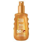 Garnier Ambre Solaire Ideal Bronze Milk-In-Spray SPF50 losjon za porjavitev v spreju 150 ml Cene