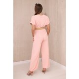 Kesi Włoski Overalls with a decorative belt at the waist salmon | shoptok.hr