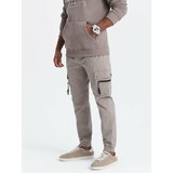 Ombre Men's JOGGER pants with zippered cargo pockets - dark beige cene