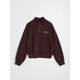 Sinsay Pamučna half-zip dukserica s vezenim natpisom Cijene