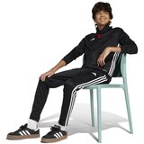 Adidas Spodnji deli trenirke Tiro pisana | Shoptok.si