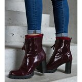 Gemre Burgundy patent heeled ankle boots decorated with Tiri fastening Cene