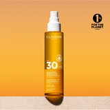 Clarins Sun Care Glowing Oil suho ulje za kosu i tijelo SPF 30 150 ml | shoptok.hr