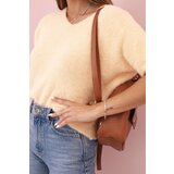 Kesi Włoski Women's sweater made of soft fleece with a V-neck short sleeves peach | shoptok.hr