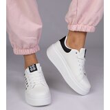  White sneakers with black detail and studs Urlana | Shoptok.si