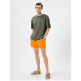 Koton Shorts Marine Shorts with a lace-up waist with pockets. Cene