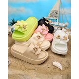 Resti Royalfashion Women's rubber flip-flops with decorative bow Nilm | ePonuda.com