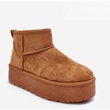 Kesi Snowball skin on a platform of brown corcoran | Shoptok.si