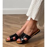 Gemre Black flat-soled flip-flops with Sarini embossing | ePonuda.com