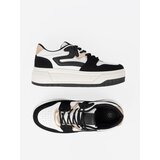 Shelvt Black and white sneakers with gold details | ePonuda.com