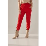 FASARDI Red trousers with elastic waistband cene