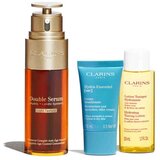 Clarins Double Serum Light Collection set: serum za obraz Double Serum Light Texture 50 ml + krema za obraz Hydra-Essentiel Silky Cream 15 ml + tonik za obraz Hydrating Toning Lotion 50 ml + rdeča kozmetična torbica za ženske | Shoptok.si