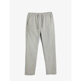 Koton Fabric Trousers with Lace Waist Slim Fit Pocket Detail Cene