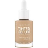 Catrice Nude Drop Tinted Serum Foundation vlažilen in osvetljevalni puder 30 ml odtenek 030C | Shoptok.si