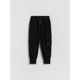 Reserved Jogger hlače s cargo džepovima - crno | shoptok.hr