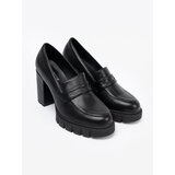 Shelvt Black loafers on a post with a trapper sole | ePonuda.com