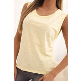 Kesi Women's sleeveless cotton blouse in a classic cut yellow | shoptok.hr