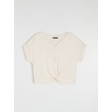 Sinsay Pamučna bluza s V-izrezom i uvijenim donjim dijelom | shoptok.hr