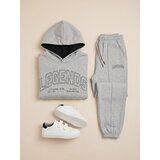 Sinsay Oversize hoodie s natpisom Slike