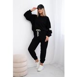 Kesi Cotton sweatshirt with a longer back + black trousers Cene