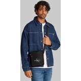 Calvin Klein Jeans Torba za čez ramo 'ESSENTIALS' opal / črna / bela | Shoptok.si