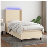  Box spring postelja z vzmetnico LED krem 90x200 cm blago | Shoptok.si